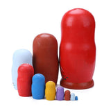 Poupée Gigogne animaux hiboux multicolores.
