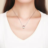 Pendentif matriochka collier argent 925 fleur rouge.