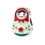 Pendentif matriochka argent 925 fleur rouge.