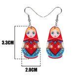 Boucles d'oreilles Matriochka bleu et rouge et motif coeur rouge.